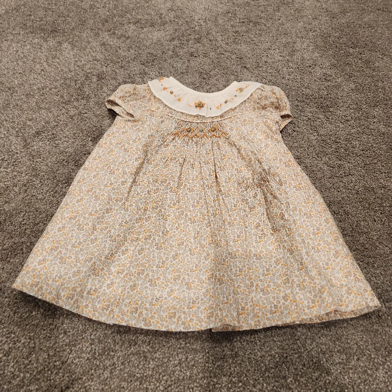 Honey Floral Smocked Dress Laid