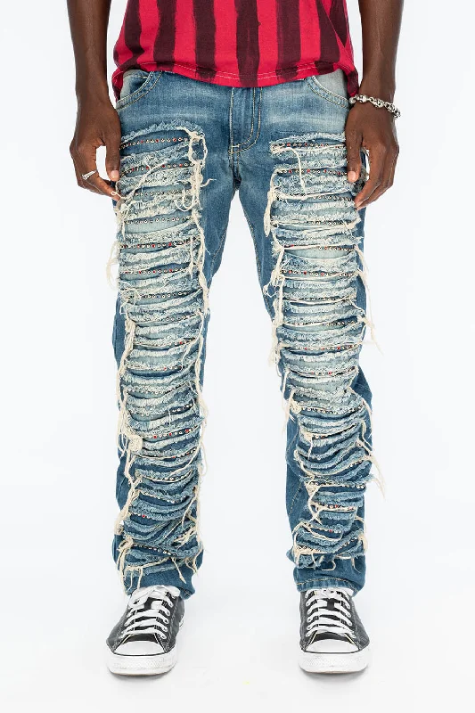 MARLON RIPPED,BROKEN HAND REPAIRED DENIM JEANS IN  MANDAN BLUE WITH STUDS AND CRYSTALS Monochromatic All